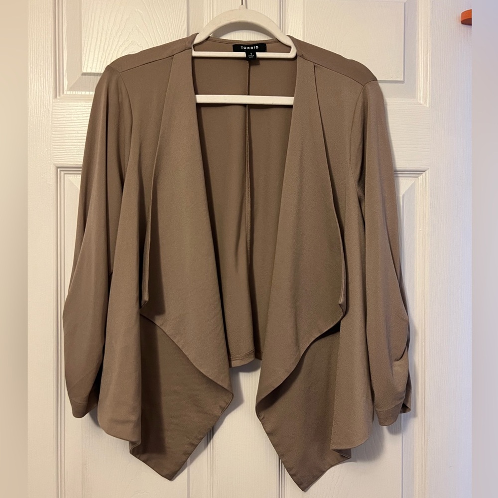 Tan women’s jacket with Waterfall Design
